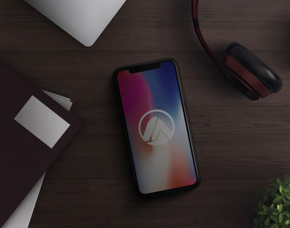 iPhone X in Desk Mockup PSD