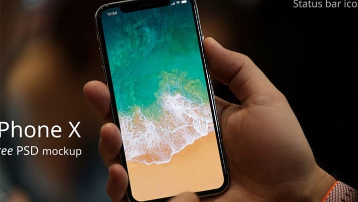 iPhone X in hand Free PSD Mockup