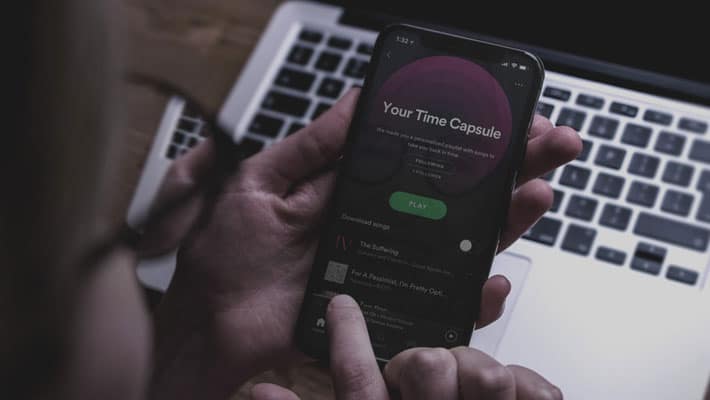 iPhone X in hand Mockup PSD