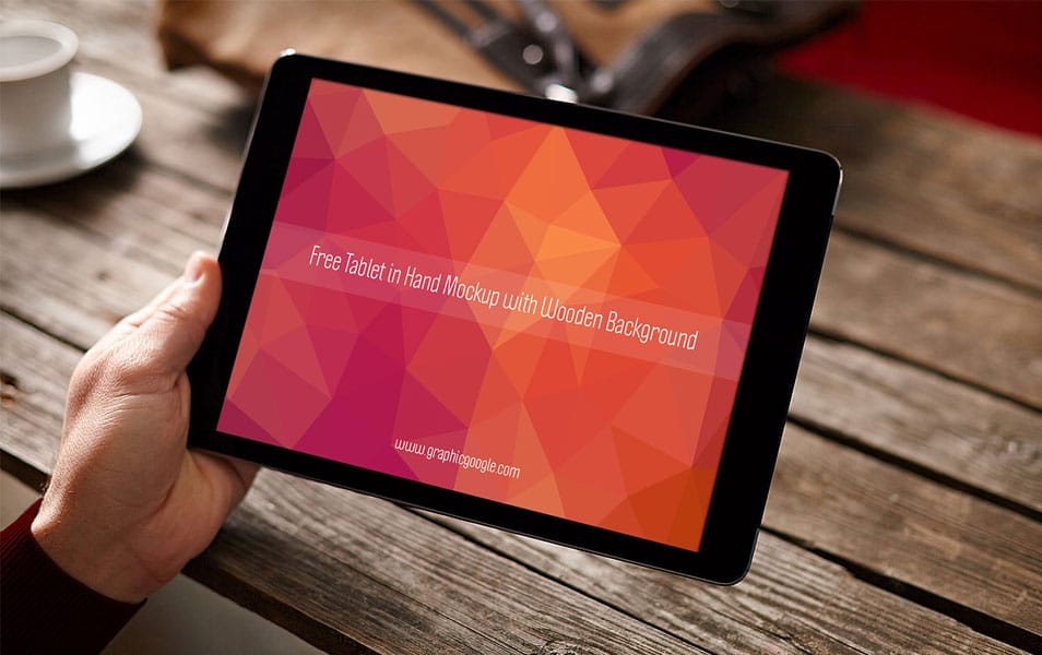Free Tablet in Hand Mockup