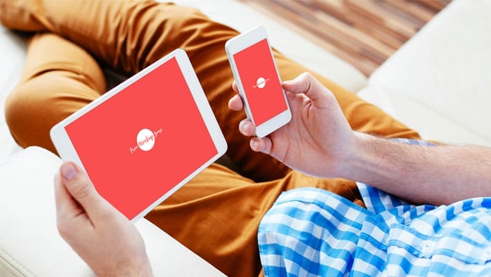 Free Man Carrying Smart Phone & Tablet Mock-up