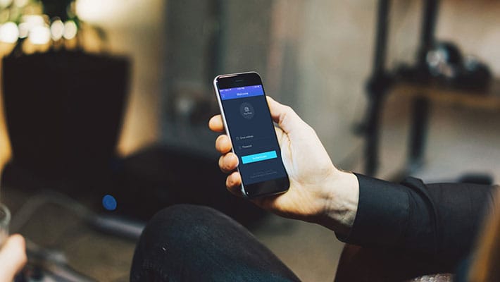 Free Executive Smartphone in Hand Mock-up PSD