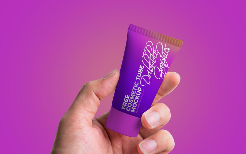 Free Man Holding Cosmetic Tube Mockup