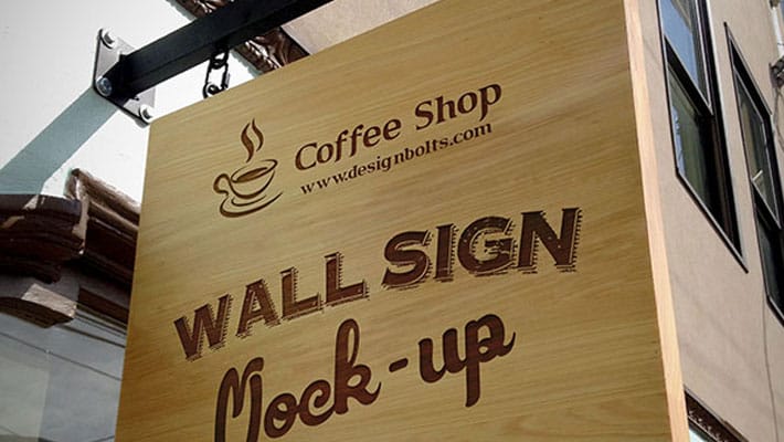 Free Wooden Outdoor Advertising Shop Wall Sign Mock-up PSD