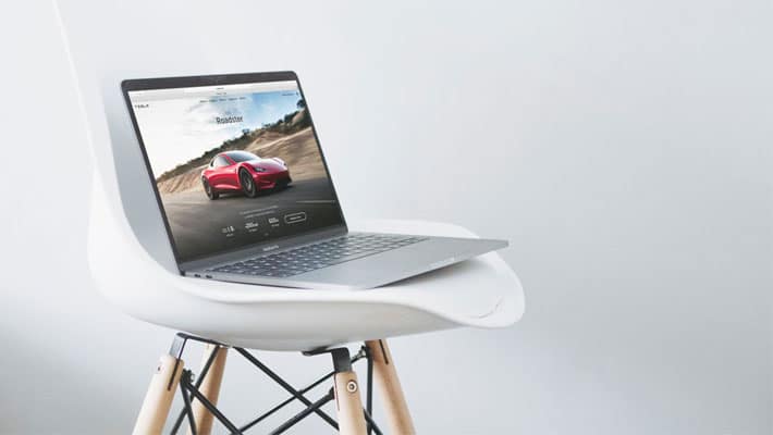 Macbook Pro On A Fancy Chair Mockup