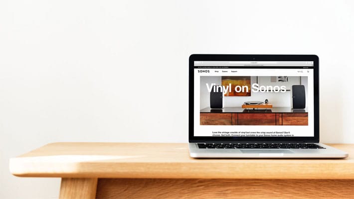 Macbook Pro On A Solid Wooden Table