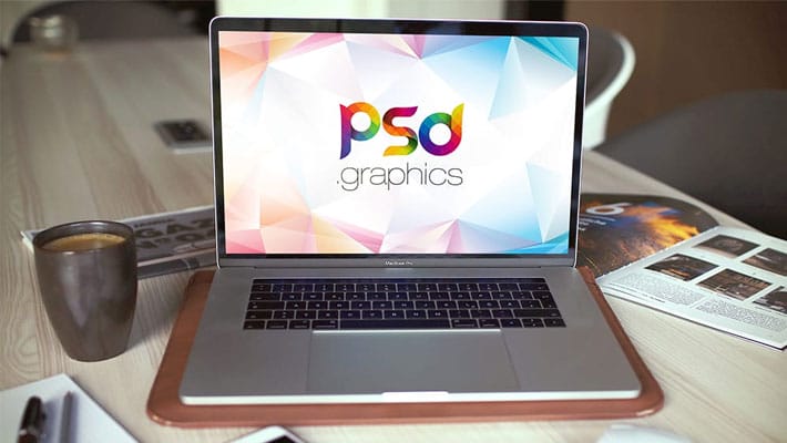 Macbook Pro in Office Mockup Free PSD