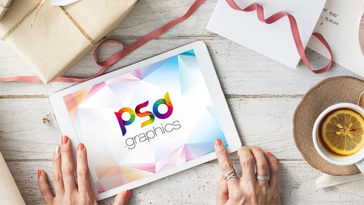 Women Working on iPad Mockup Free PSD