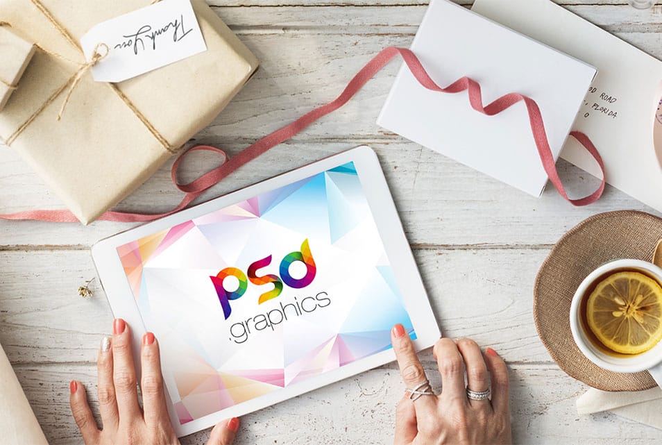 Women Working on iPad Mockup Free PSD