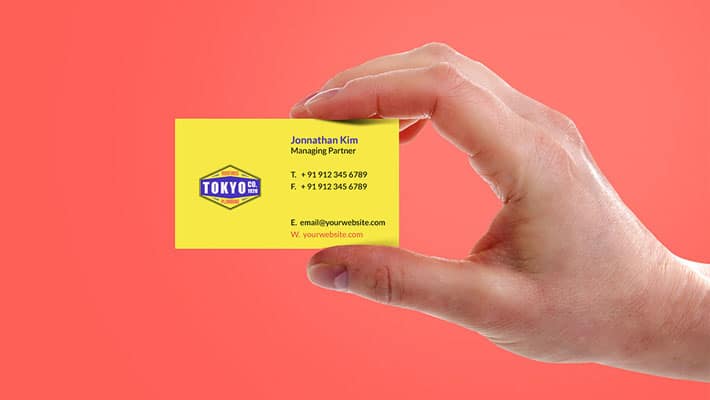 Hand Holding Business Card Mockup PSD