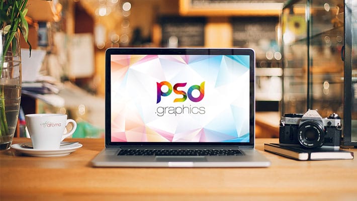 Macbook Pro on Desk Mockup PSD