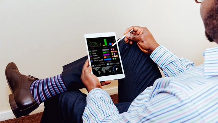 Man holding iPad Mockup