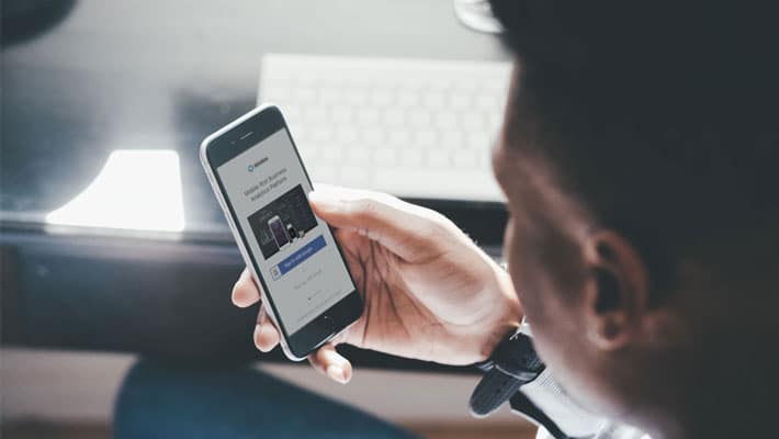 Man viewing on iPhone Screen Mockup