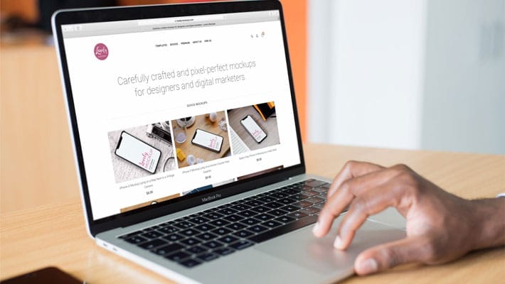 Mockup Of A Person Working On Macbook Pro