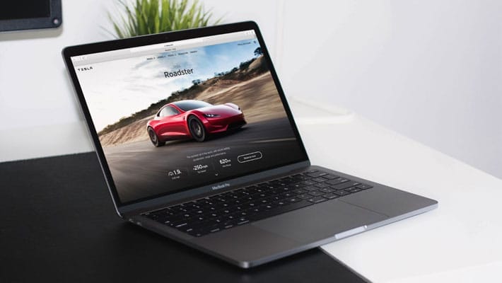 Space Gray Macbook on A Table