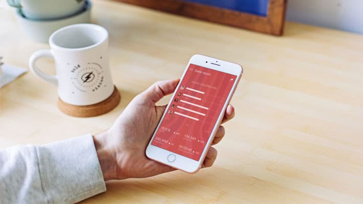White iPhone in Man’s Hand