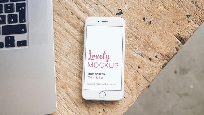 White IPhone Mockup On Carpenter Desk » CSS Author