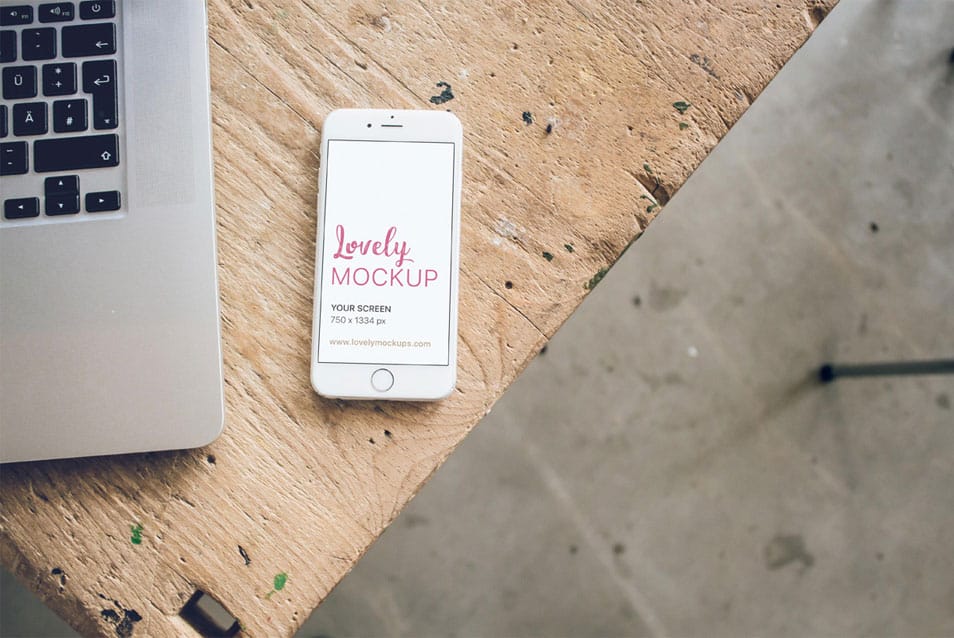 White iPhone Mockup on Carpenter Desk