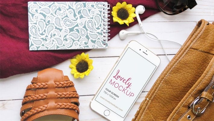 White iPhone On A Creative Desk