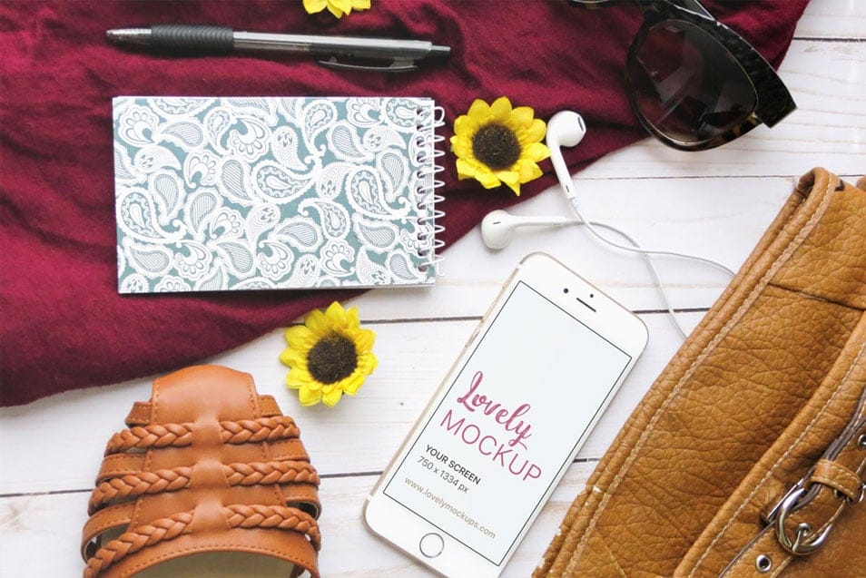 White iPhone On A Creative Desk