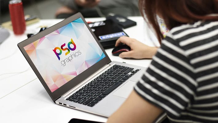 Female Working on Macbook Mockup PSD