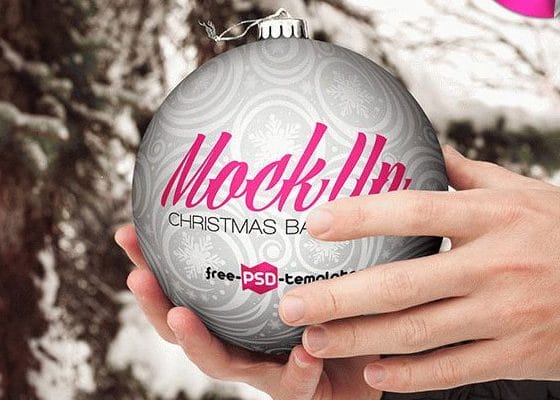 Free Christmas Ball Hand Hold Mock-up in PSD