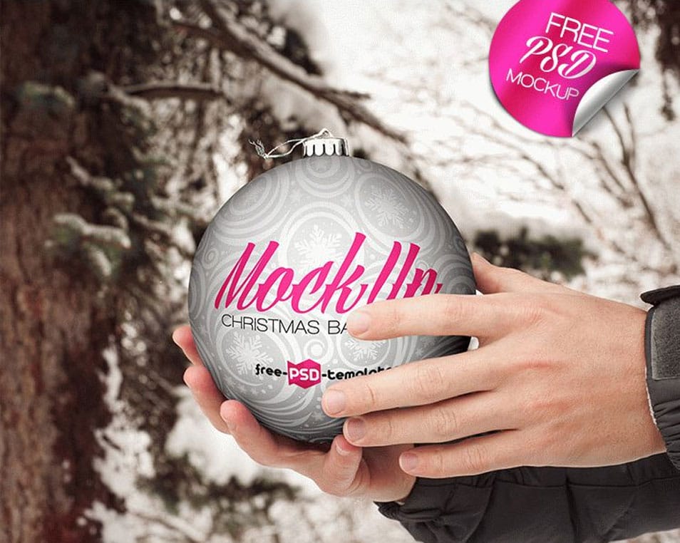 Free Christmas Ball Hand Hold Mock-up in PSD