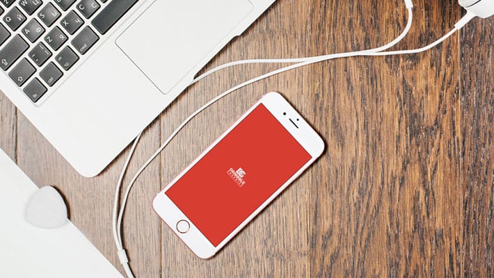 Free iPhone 7 With Wooden Desktop & Headphones Mockup