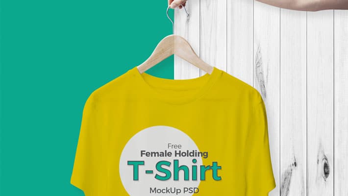 Free Female Holding T-Shirt Mockup PSD