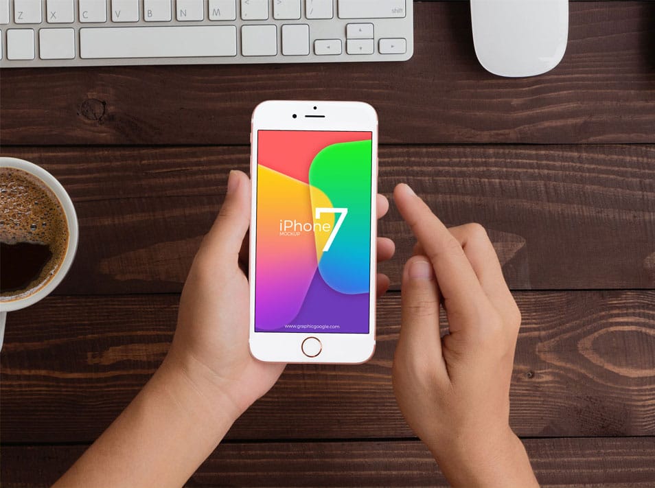 Free Man Holding iPhone 7 Mockup PSD Template