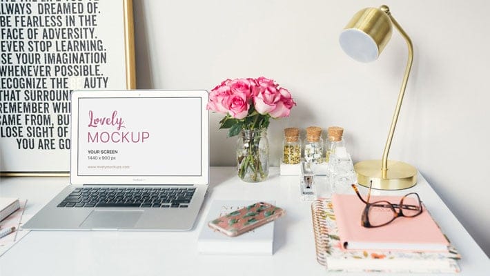 Macbook Air With Roses On A Table