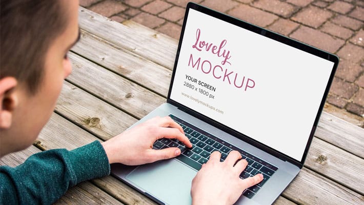 Macbook Mockup And A Hard Working Man