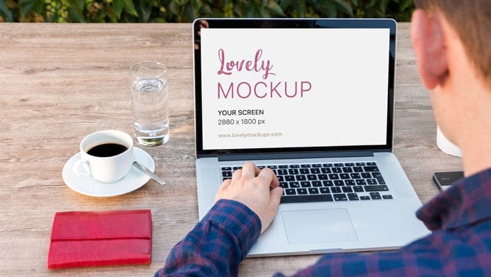 Macbook Mockup And Young Man With Blue Shirt