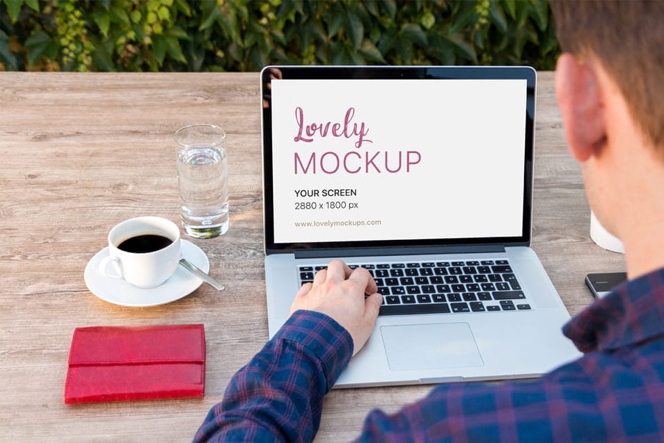 Macbook Mockup And Young Man With Blue Shirt