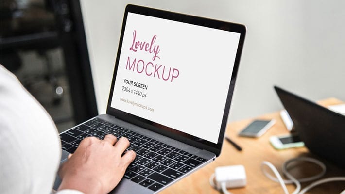 Macbook Mockup In Woman’s Hands Surfing the Internet