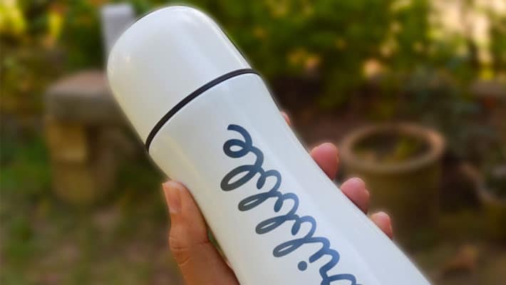 Free White Bottle Logo Mockup PSD