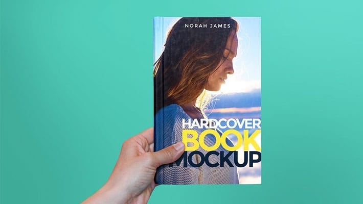 Hardcover Book In Hand Mockup