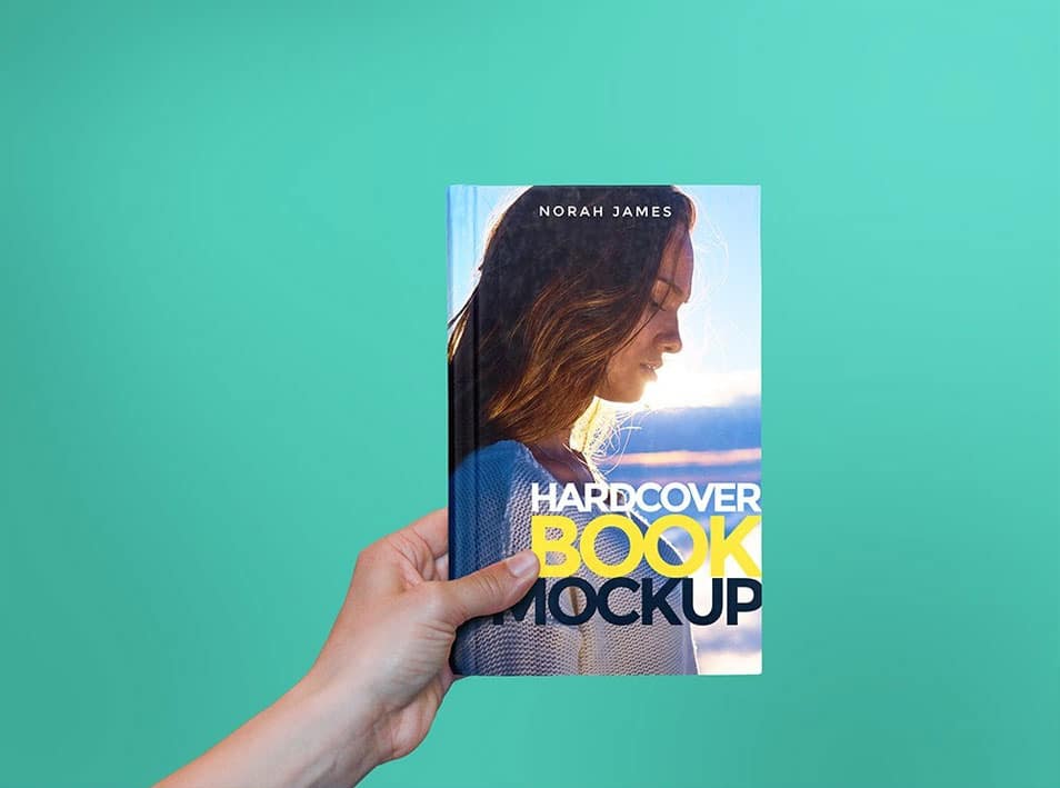 Hardcover Book In Hand Mockup