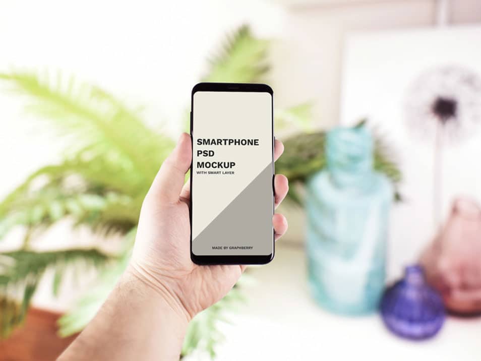 Hand Holding Smartphone Mockup