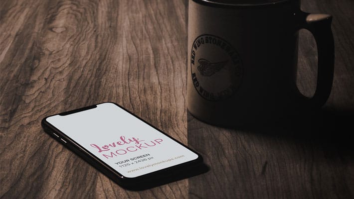 iPhone X Mockup On A Wooden Table