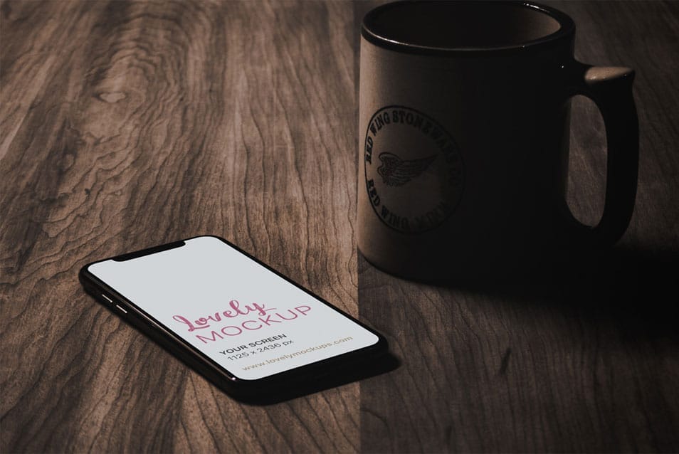 iPhone X Mockup On A Wooden Table