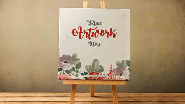 Free Canvas on Wooden Stand Mockup