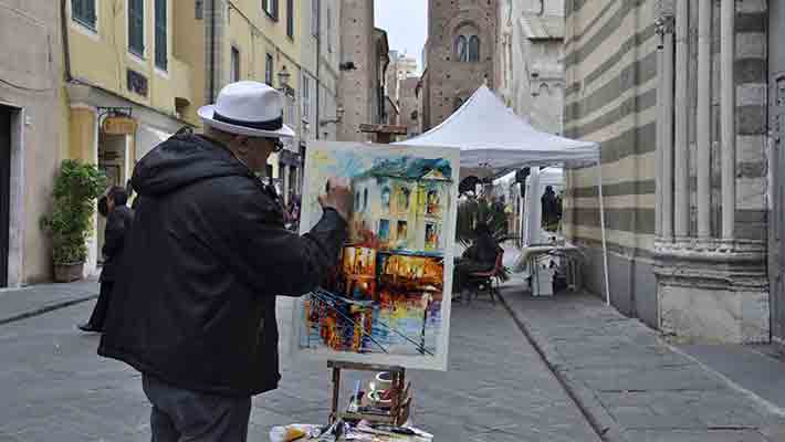 Free Painter Painting On Canvas Mockup PSD