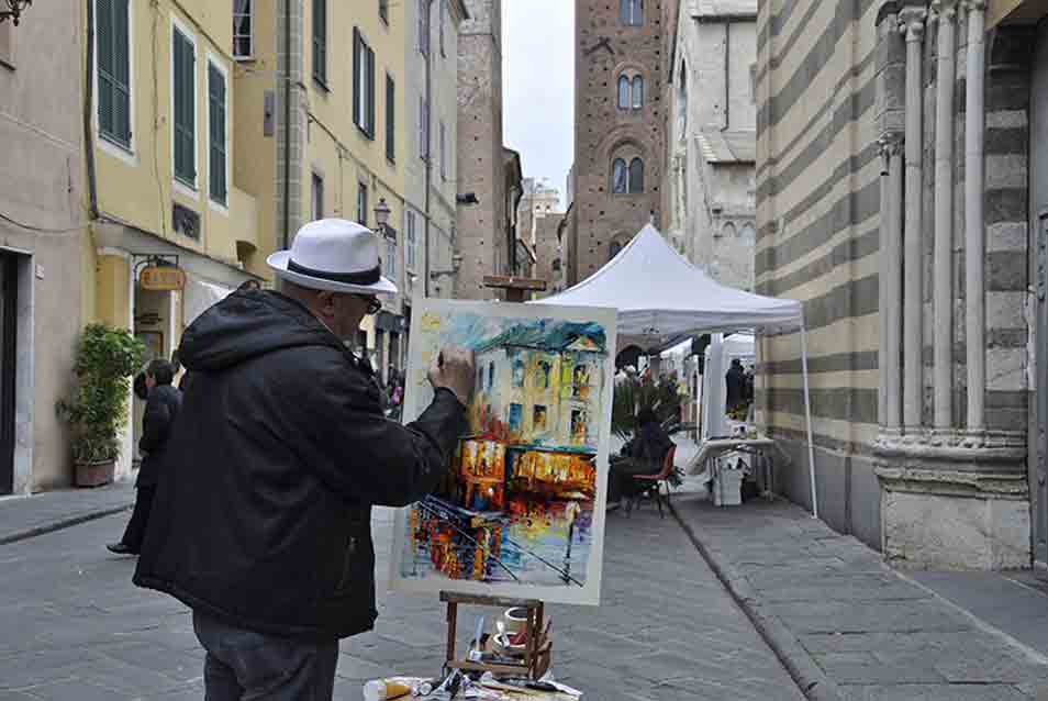 Free Painter Painting On Canvas Mockup PSD