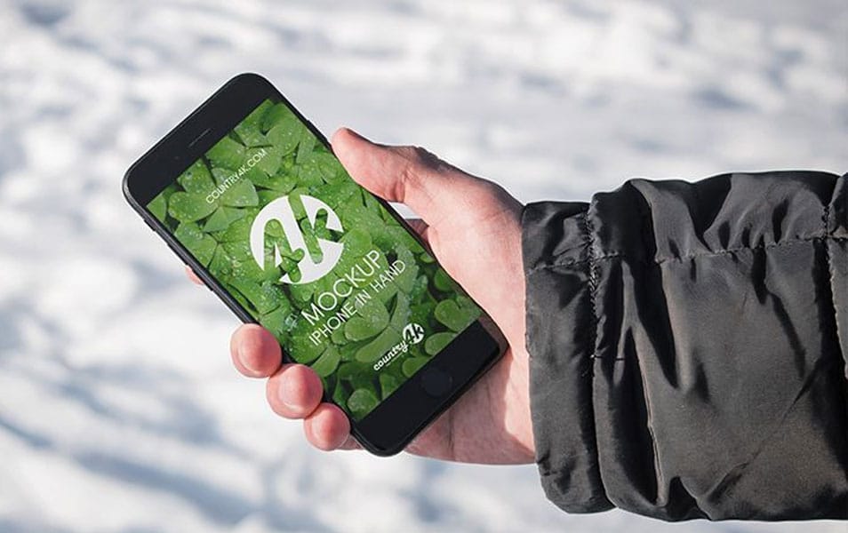 Free iPhone in Hand PSD MockUp in 4k