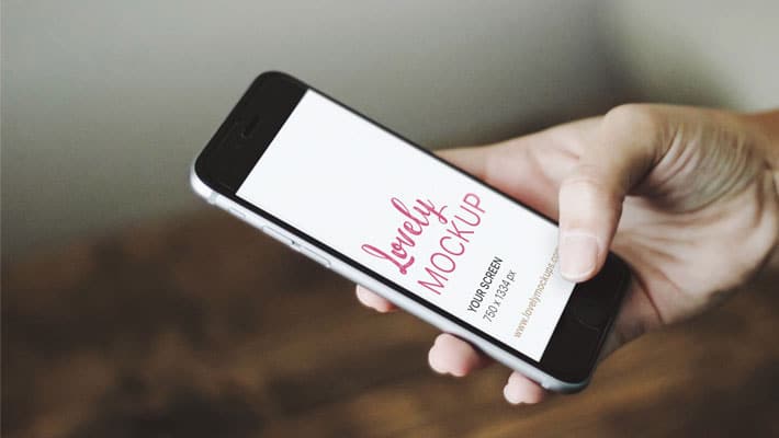 iPhone Mockup in Man’s Hand