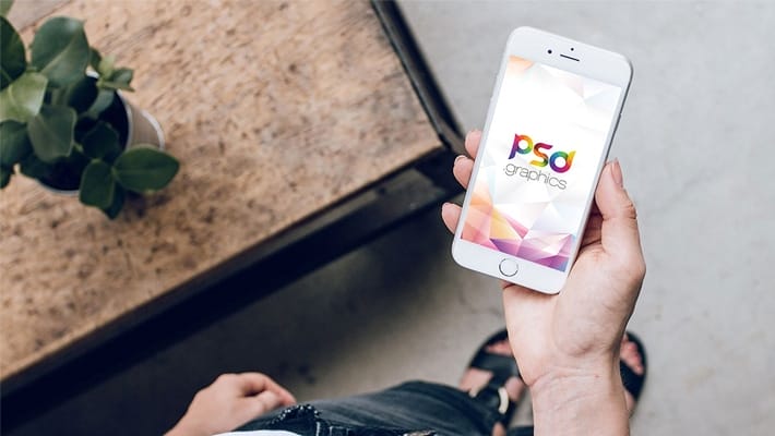 Female Holding iPhone Mockup PSD