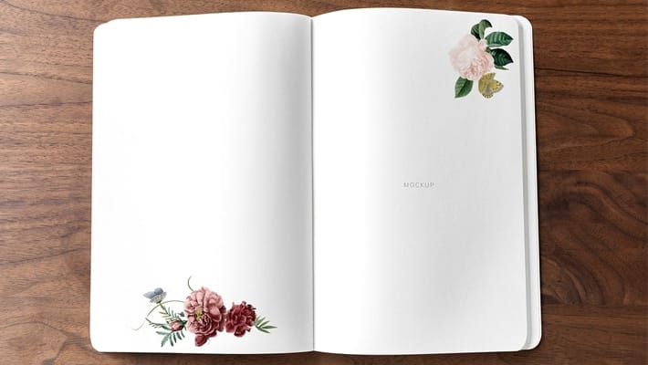 Floral Notebook Mockup on a Wooden Table