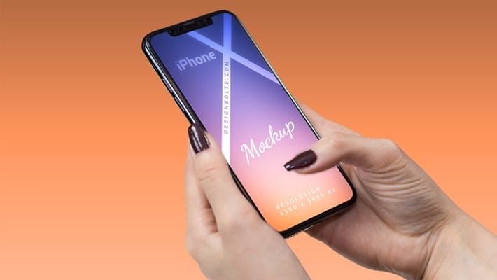 Free Female Hand Holding iPhone X Mockup PSD