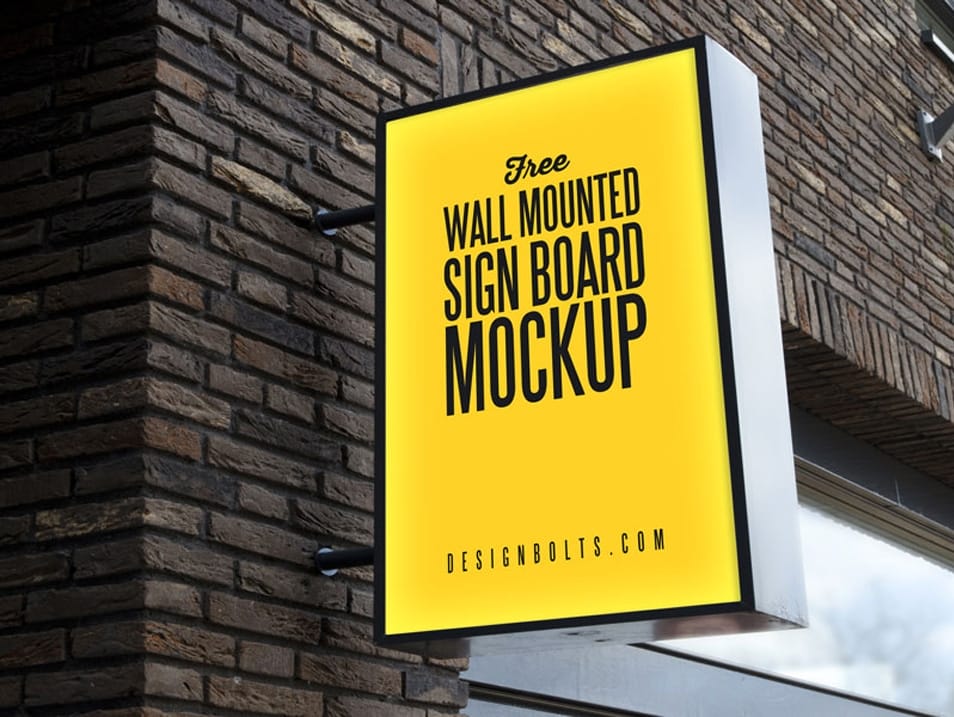 Free Outdoor Advertising Wall Mounted Sign Board Mockup PSD